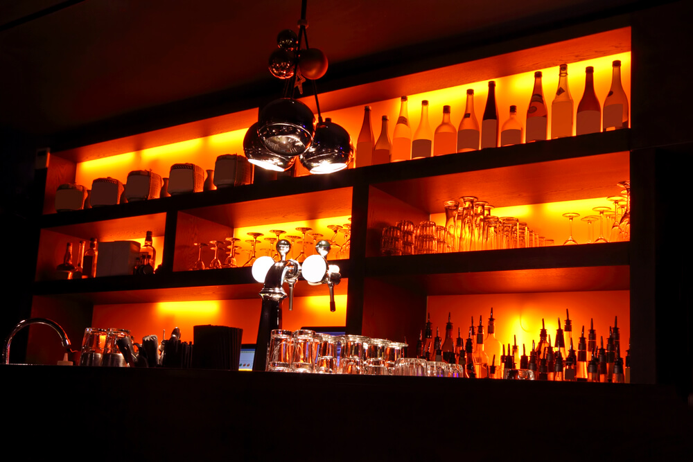 Best Montreal Wine Bars! A picture of a dark, romantic Montreal Bar!